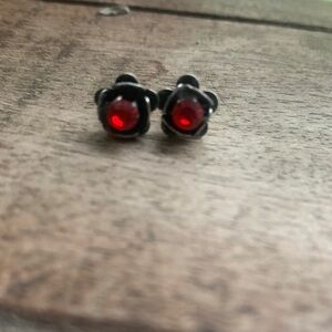 Black Flower Stud Earrings with Red Gem Centers